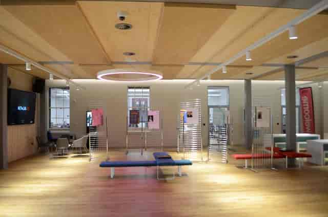 Modern event space in Dreadnought with wooden flooring, ideal for workshops and networking.