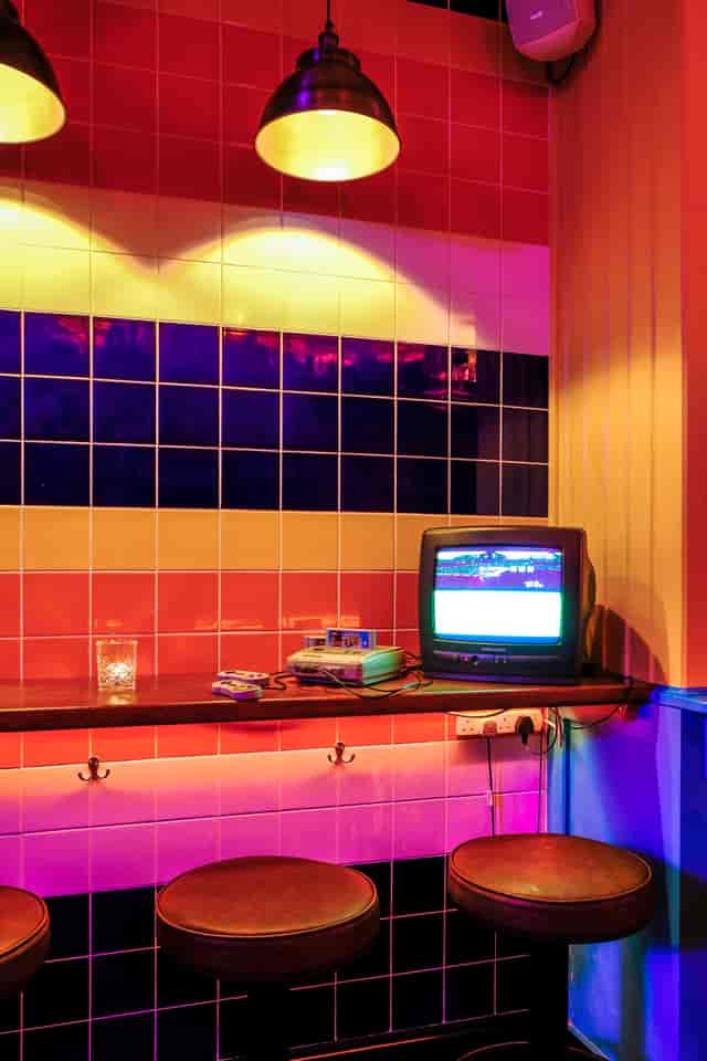 Retro-inspired event space in Farringdon featuring vibrant tiled walls for themed parties or hire.