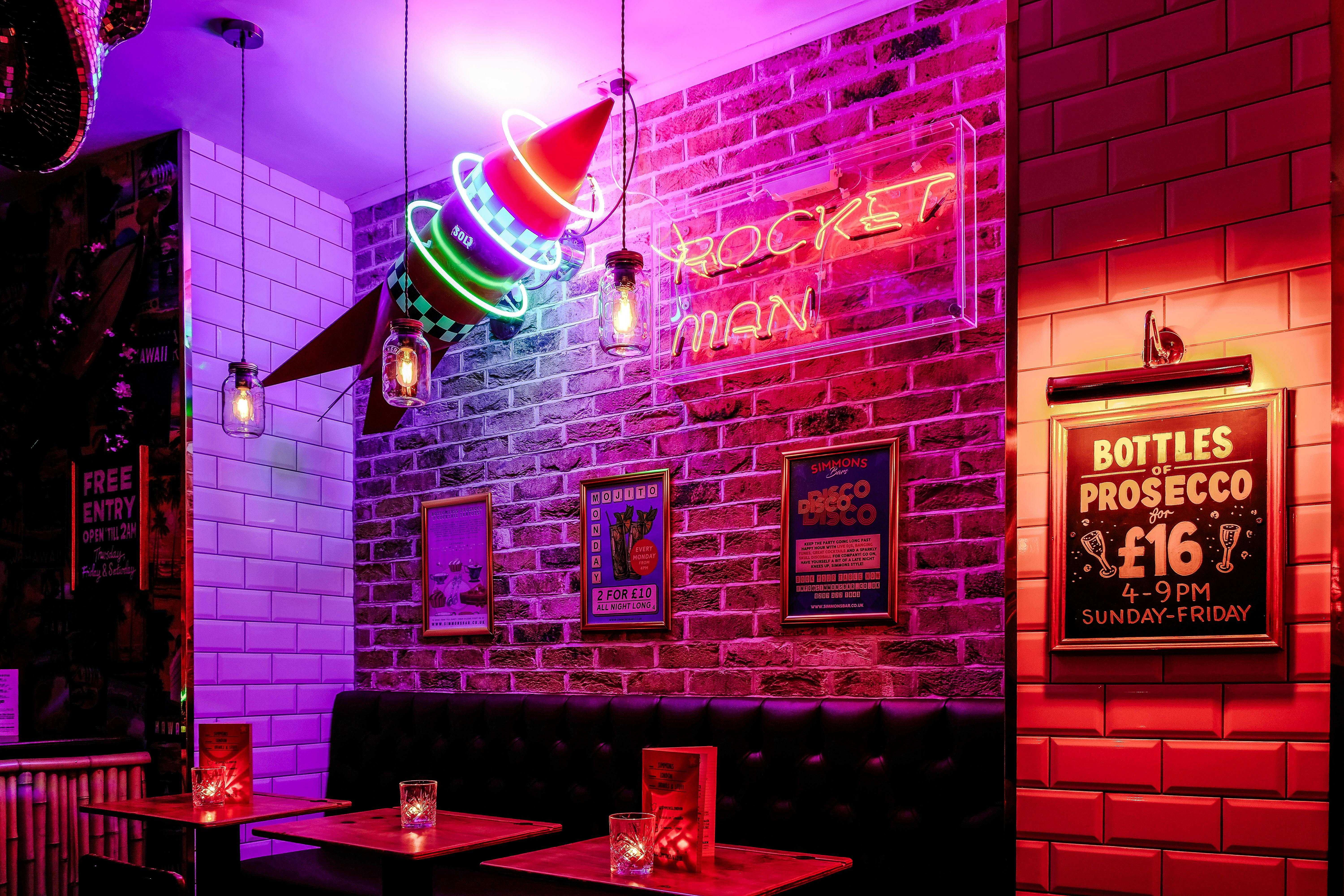 Vibrant venue hire in Farringdon with neon decor for casual events and parties.