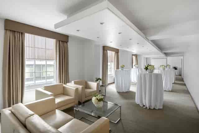 Modern event space at COMO Metropolitan London, perfect for networking and receptions.