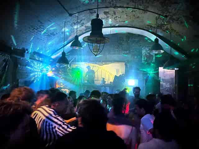 Vibrant event space in Loveshack with dynamic lighting for parties and social gatherings.