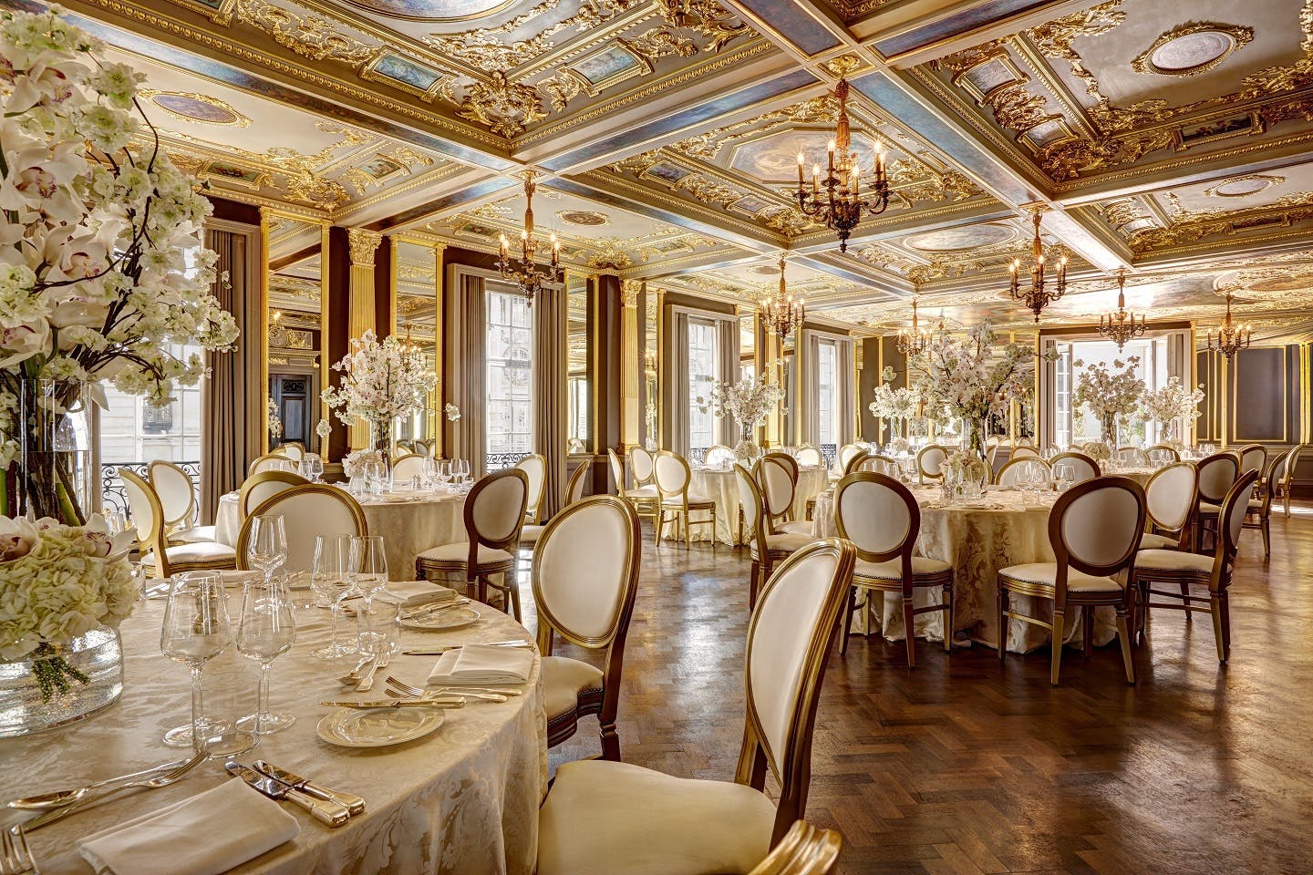 Elegant Pompadour Ballroom with ornate ceiling, perfect for weddings and corporate events.