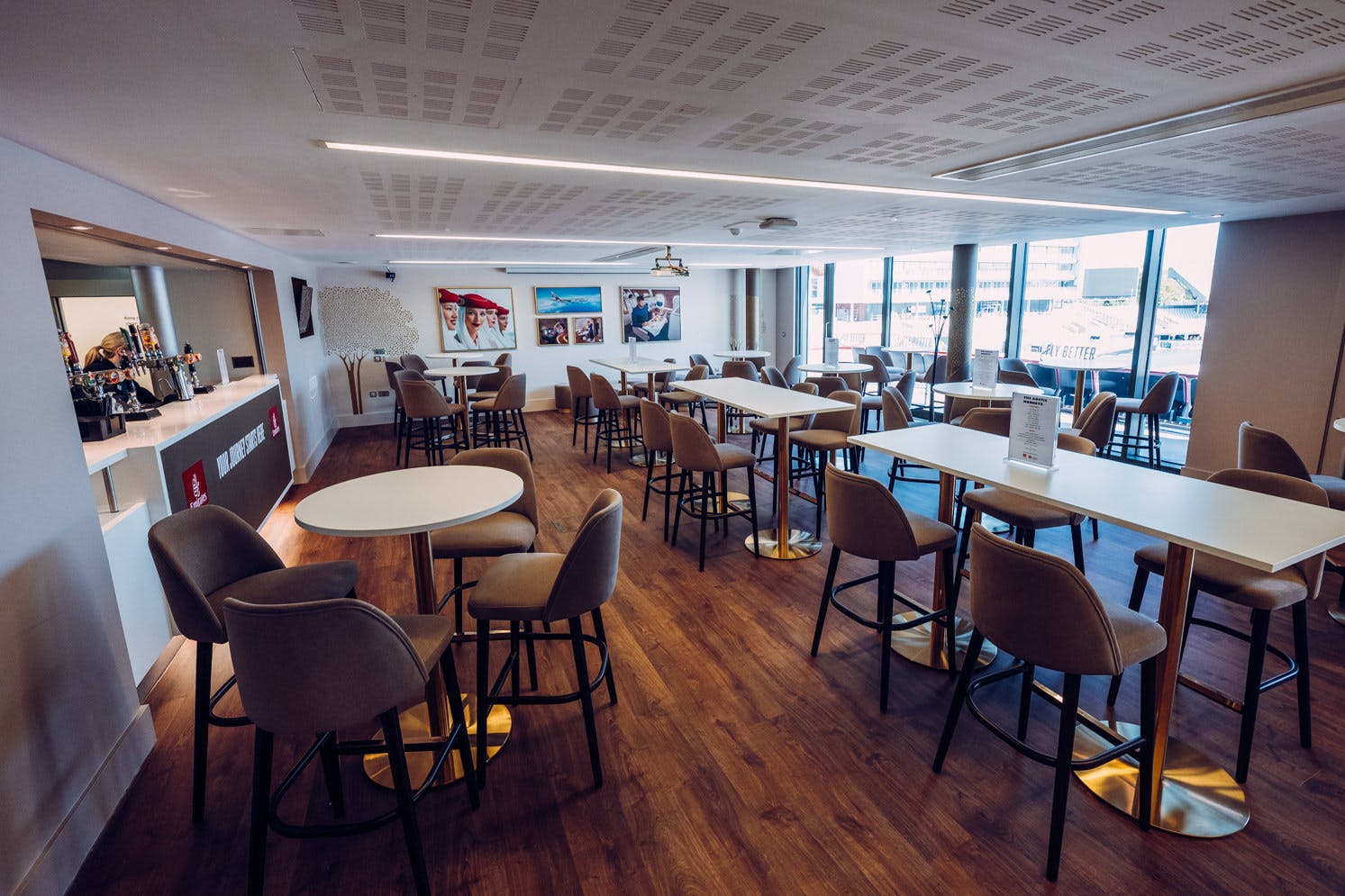 Emirates Lounge at Old Trafford: modern event space with natural light for corporate gatherings.