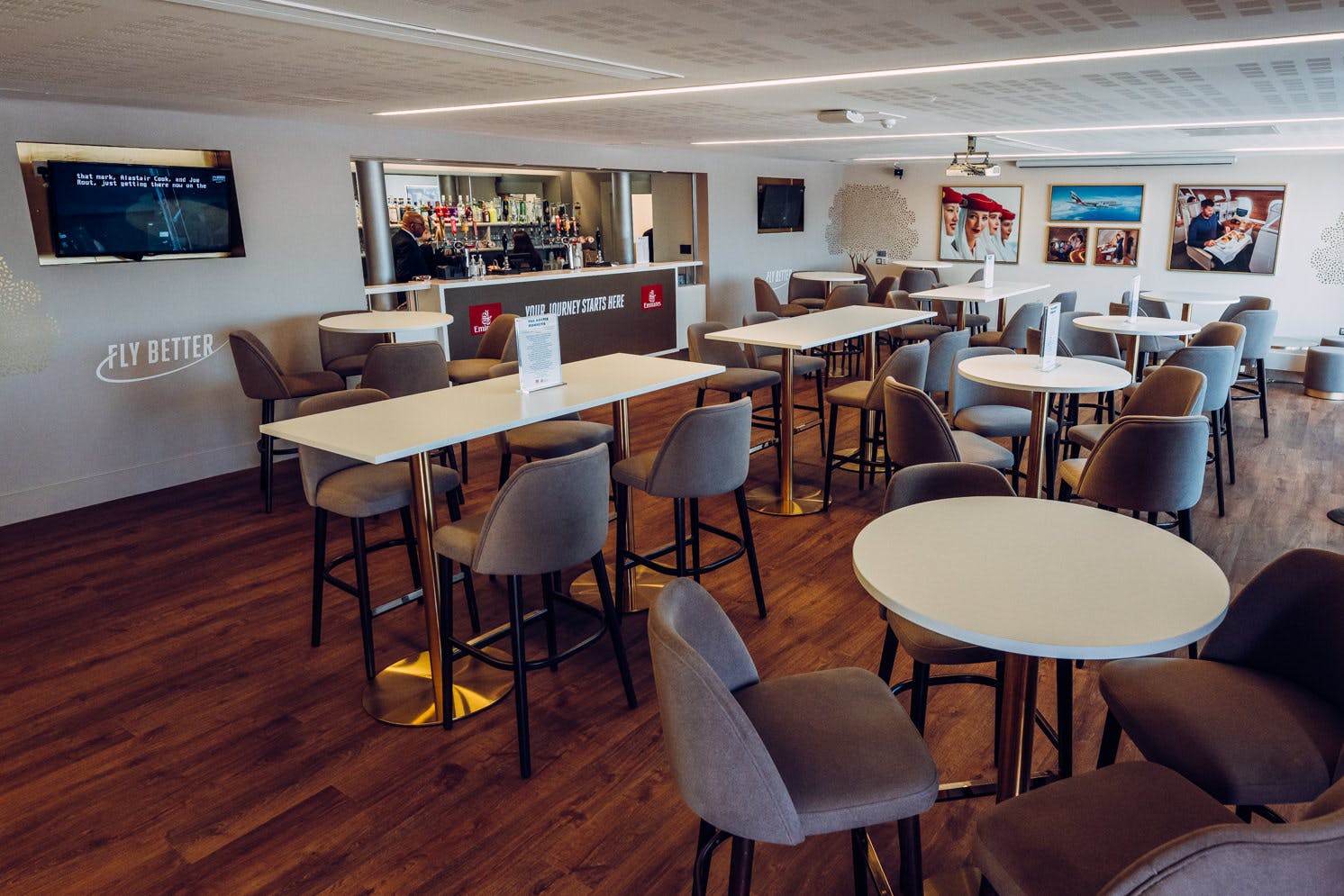 Emirates Lounge at Old Trafford: modern event space with sleek seating for networking events.