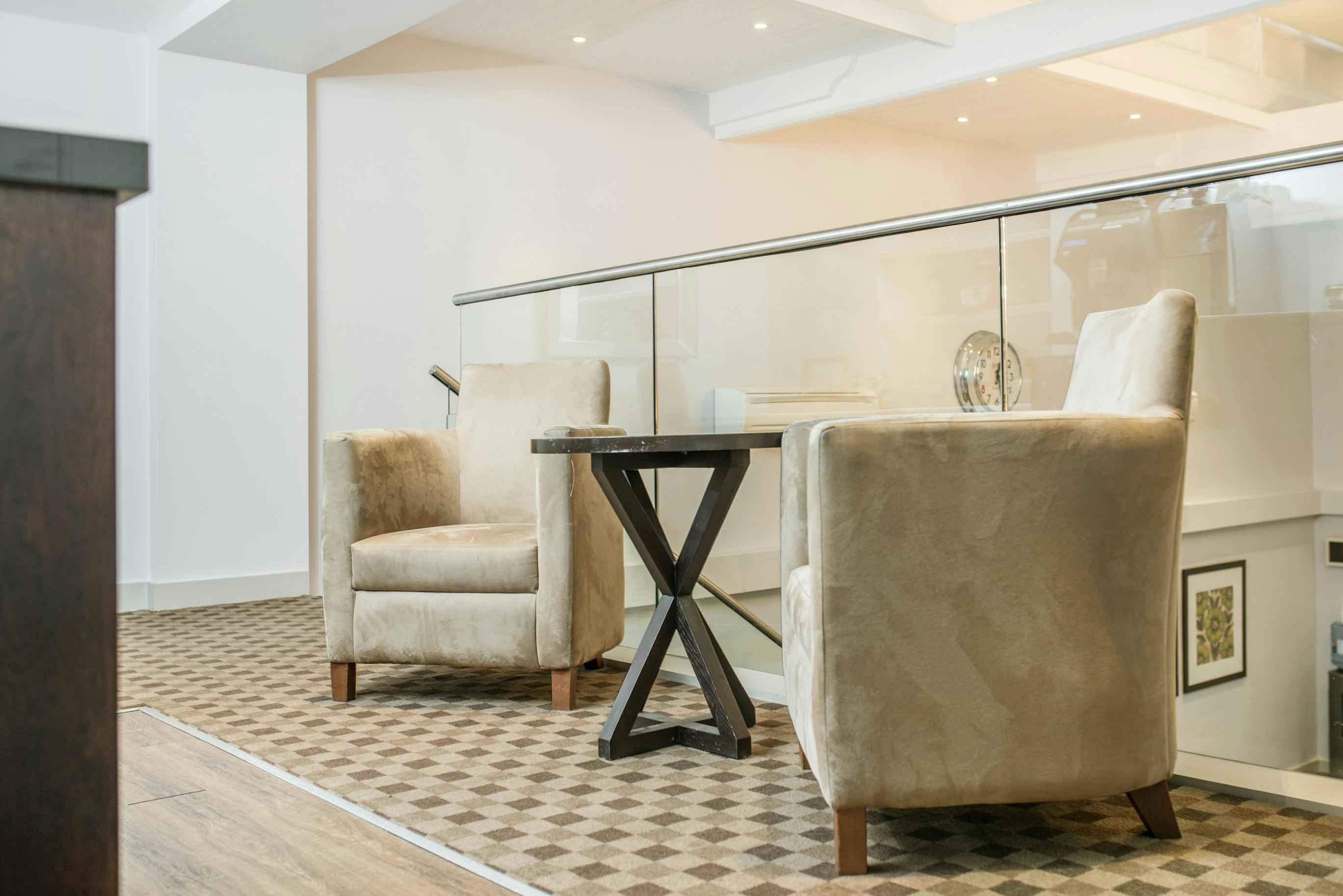 Stylish seating area in The Court, New Place Hotel, ideal for networking events.