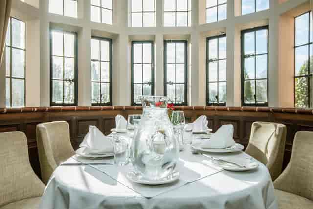 Elegant dining table in The Bristol Room, ideal for upscale events and meetings.