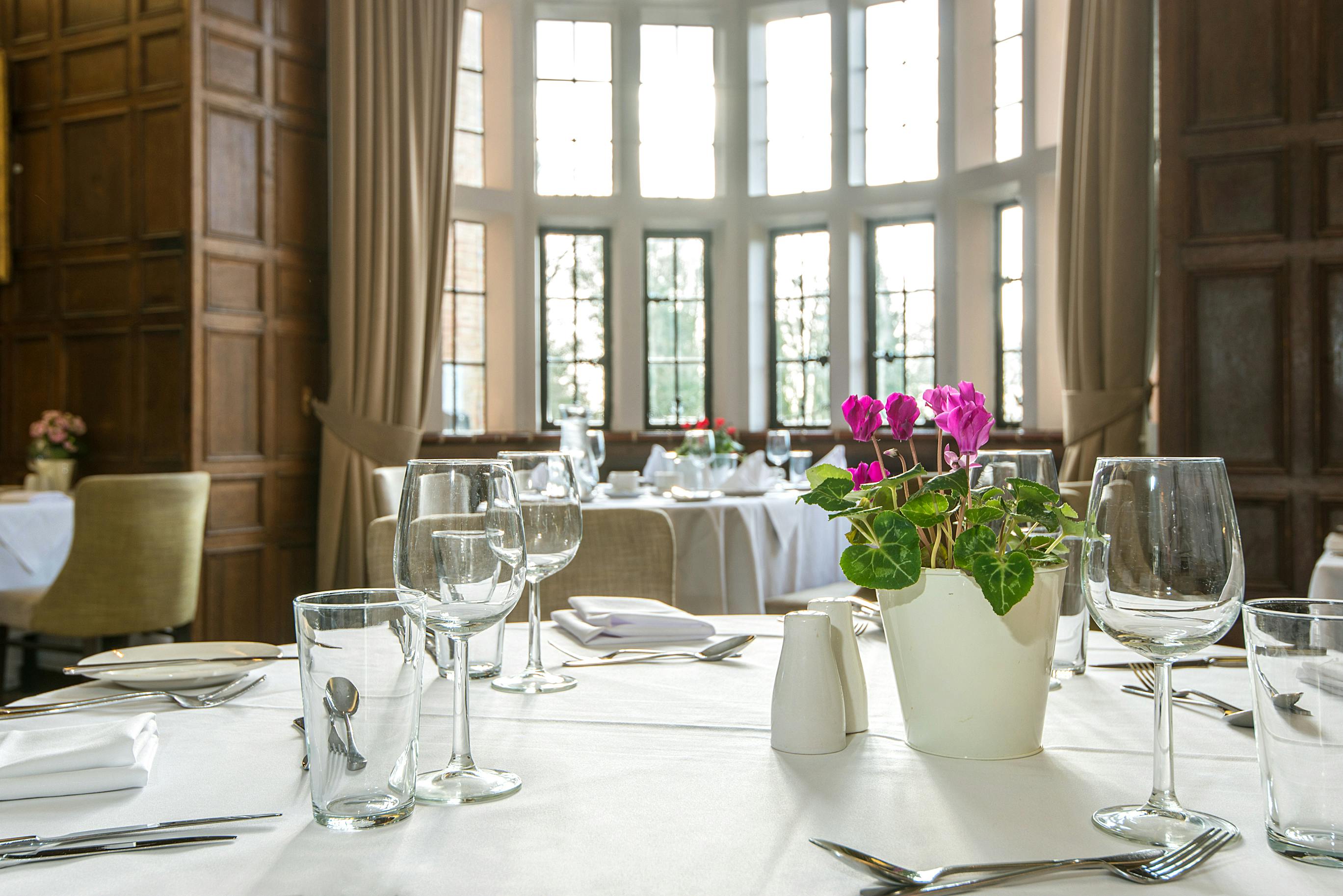 Elegant dining area in The Bristol Room, New Place Hotel, perfect for events and gatherings.