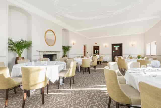 Elegant dining room at New Place Hotel, perfect for corporate events and gatherings.