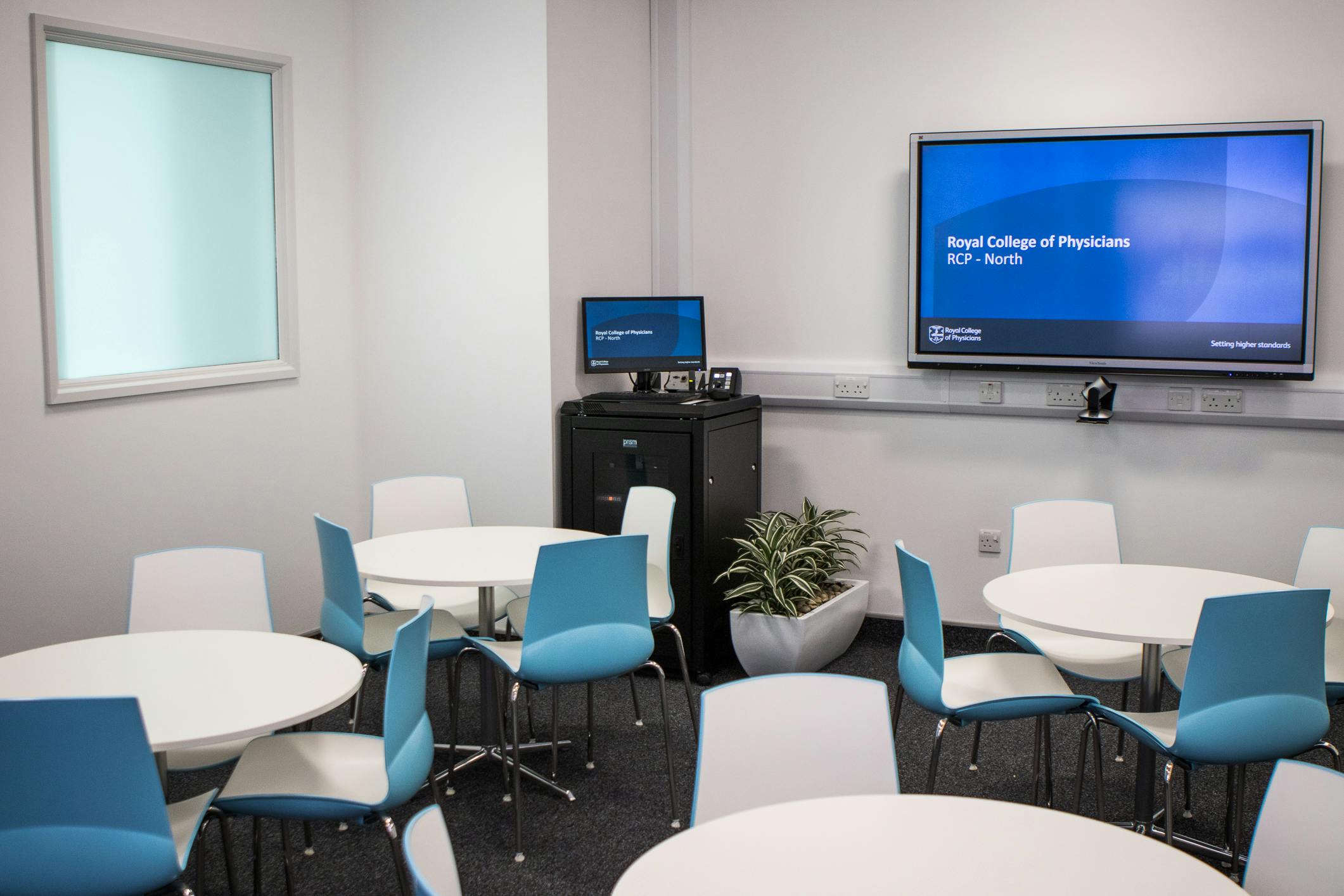 Middlesbrough Room in RCP North: modern meeting space with round tables for workshops.