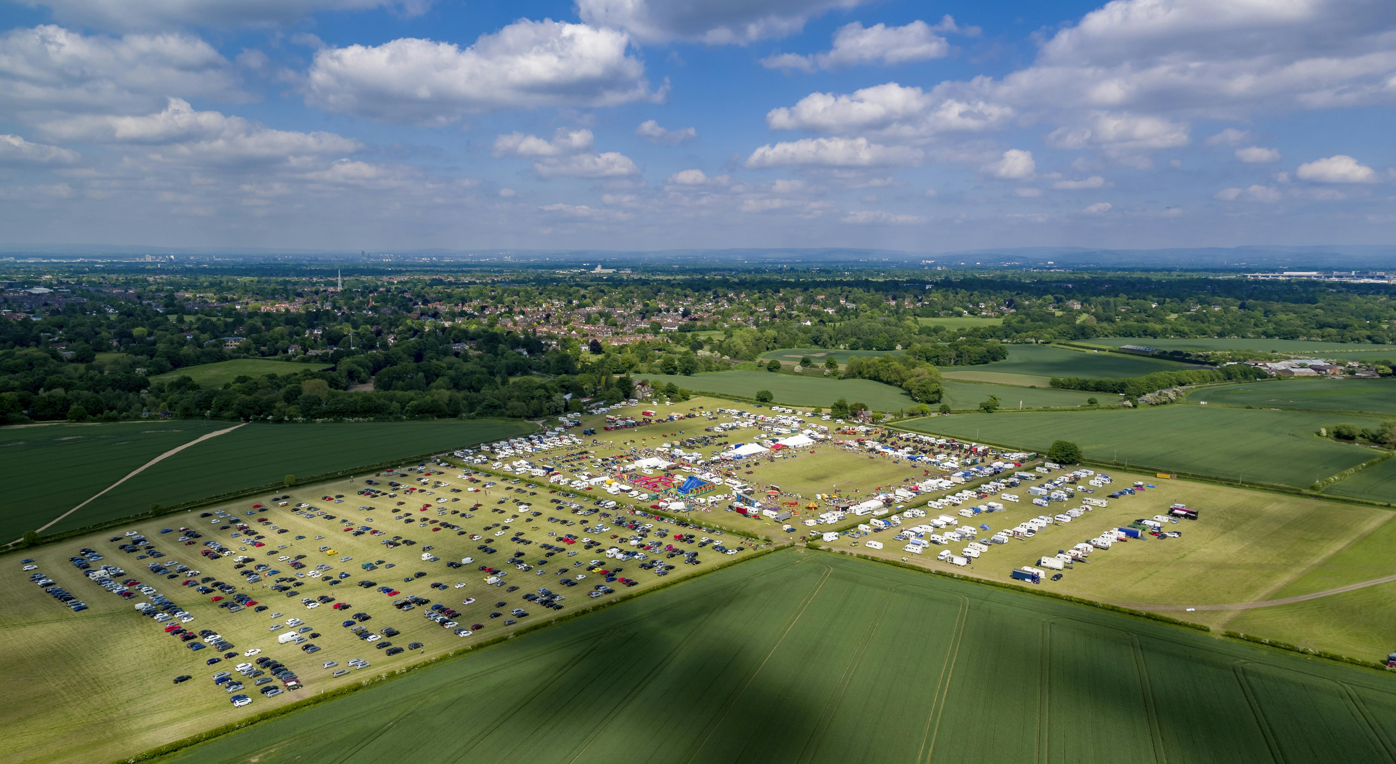 Ashley Showground outdoor event space with tents, ideal for festivals and gatherings.