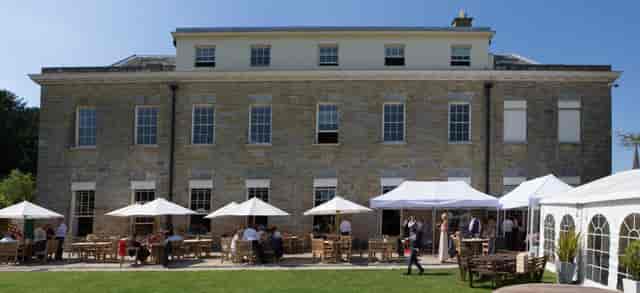 Garden marquee at Proud Country House, ideal for outdoor events with lush lawn seating.