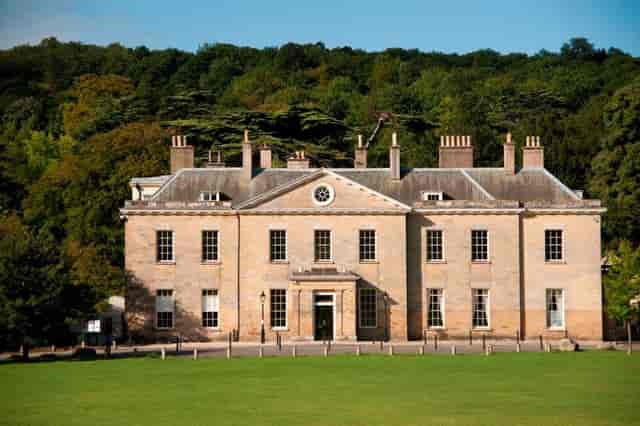 Elegant venue at Proud Country House with lush greenery for events and meetings.