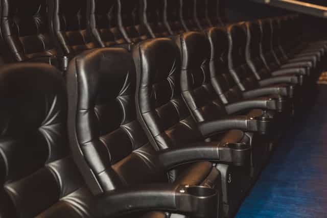 Plush black seating at Cineworld O2 Greenwich for stylish presentations and screenings.