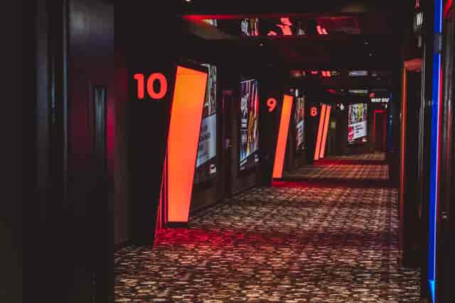 Modern corridor with digital displays at Cineworld O2, ideal for conferences and exhibitions.