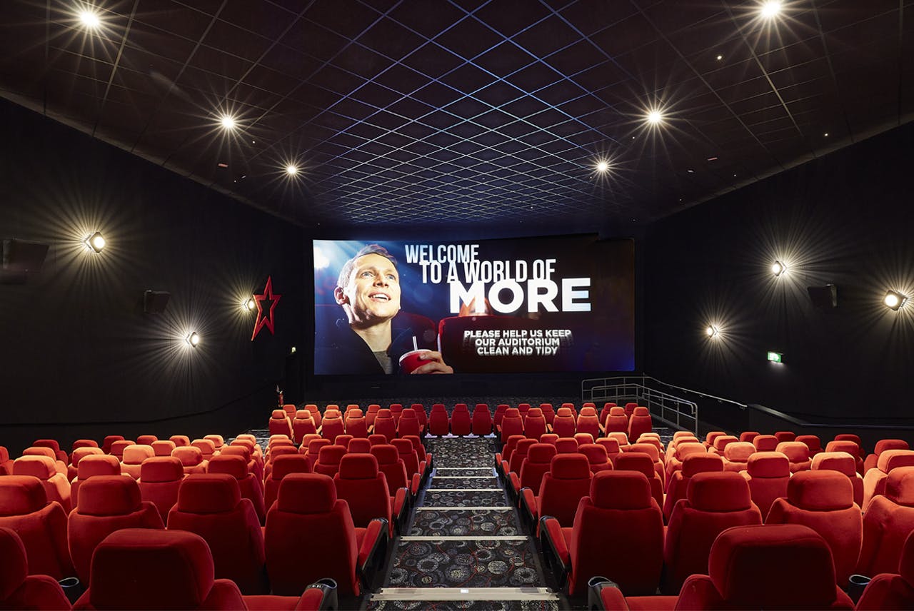 Cineworld Birmingham auditorium with plush red seating for corporate events and screenings.