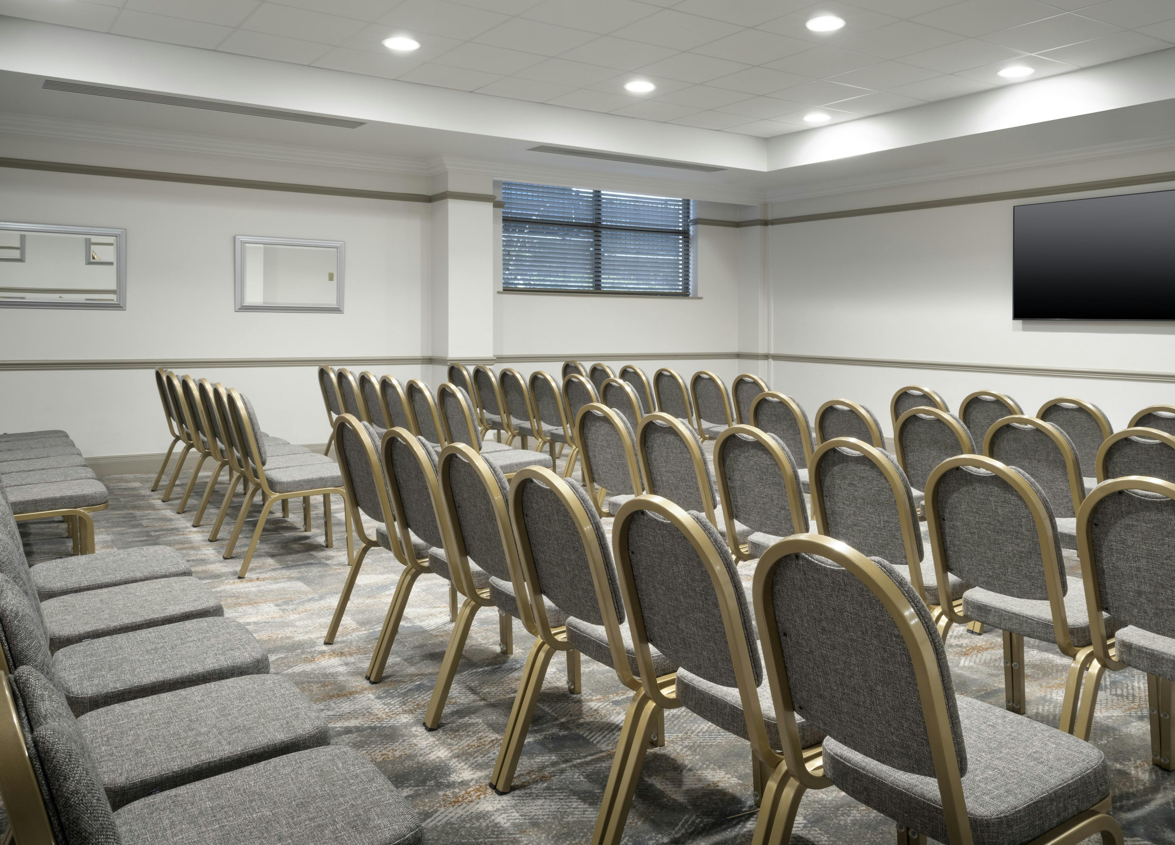 Lever Room at Delta Hotels Liverpool, set for a corporate seminar with organized seating.