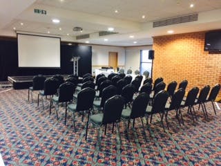 Springfield Lounge at DW Stadium: ideal meeting space for conferences with stage and projector.