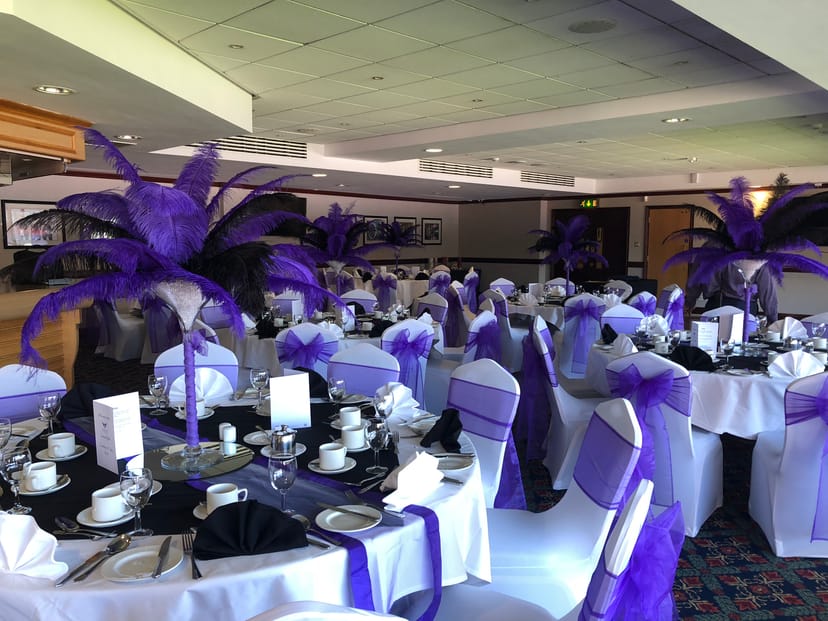 Elegant event space at Phoenix Lounge, featuring black and white decor for weddings and galas.