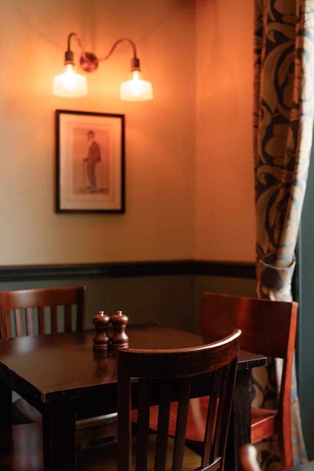 Intimate dining corner at The Perseverance, perfect for private business meetings and client dinners.