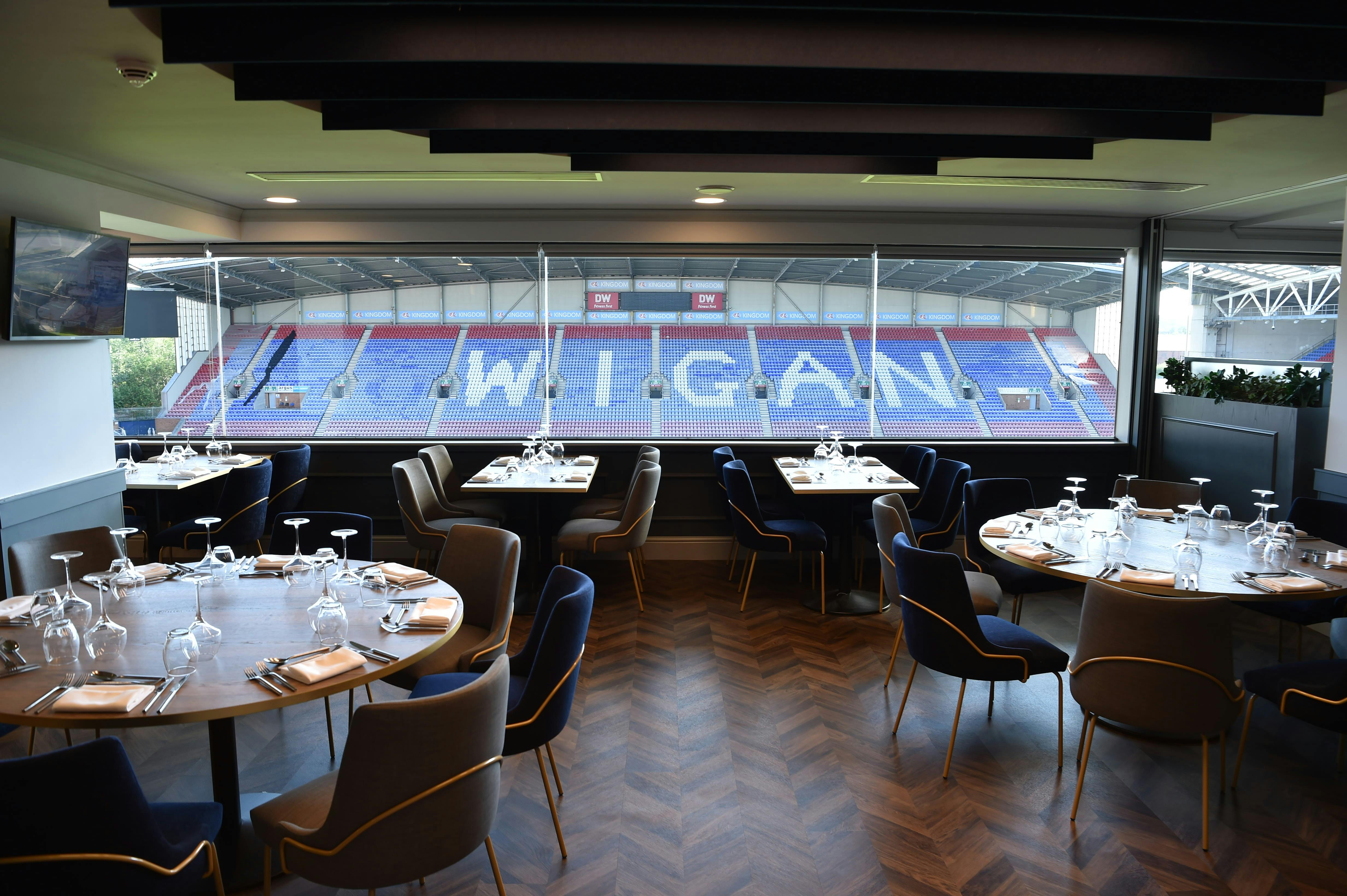 Elegant dining setup in Chairman's Club, DW Stadium for corporate events and meetings.