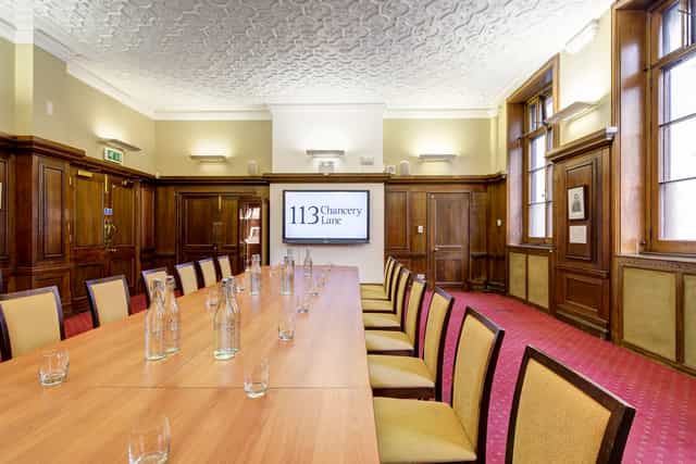 Chancery Lane boardroom, wood paneling, executive meeting