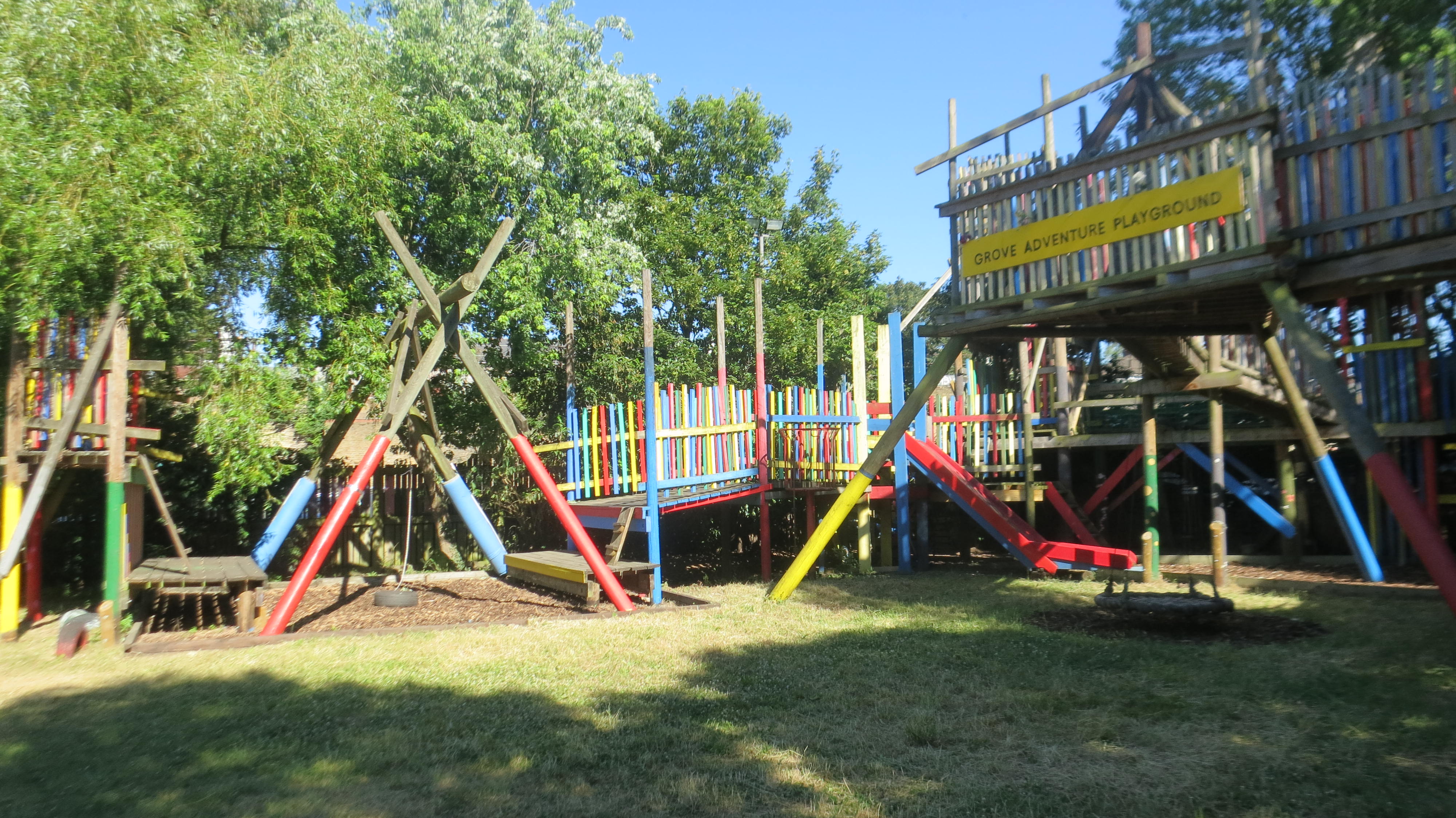 Vibrant outdoor playground at Grove Adventure for team-building and family events.