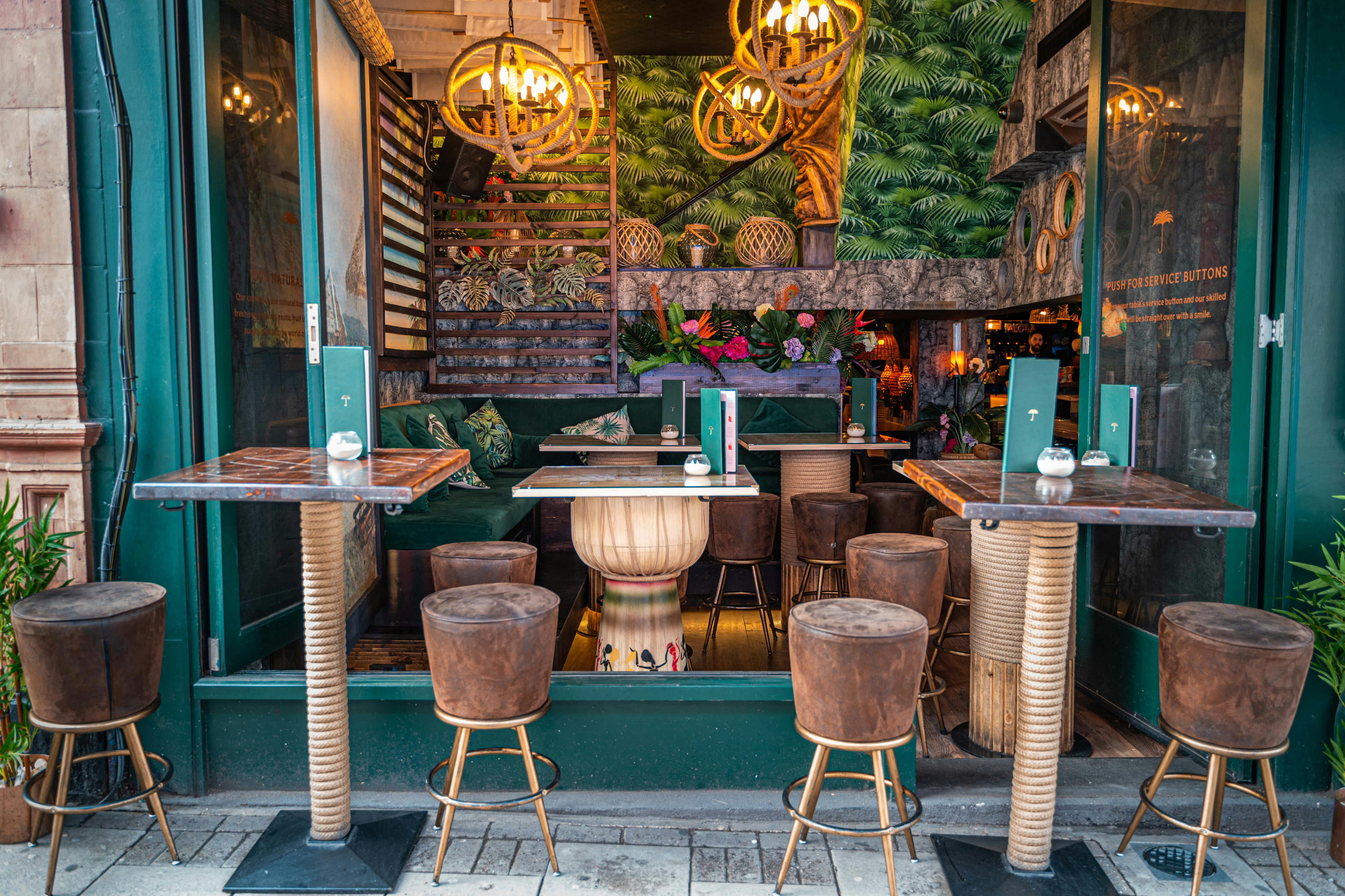 Vibrant outdoor seating at Laki Kane, ideal for casual meetings and networking events.