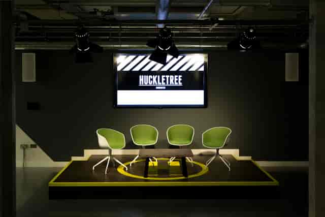 Modern event space in Huckletree Shoreditch with stylish chairs for corporate workshops.