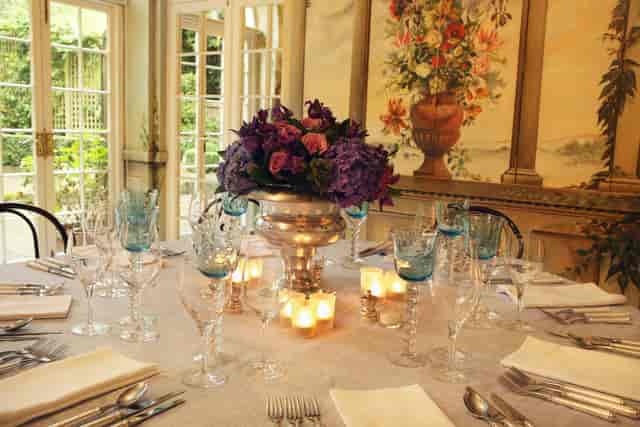 Elegant dining table in The Orangery, perfect for weddings and upscale events.