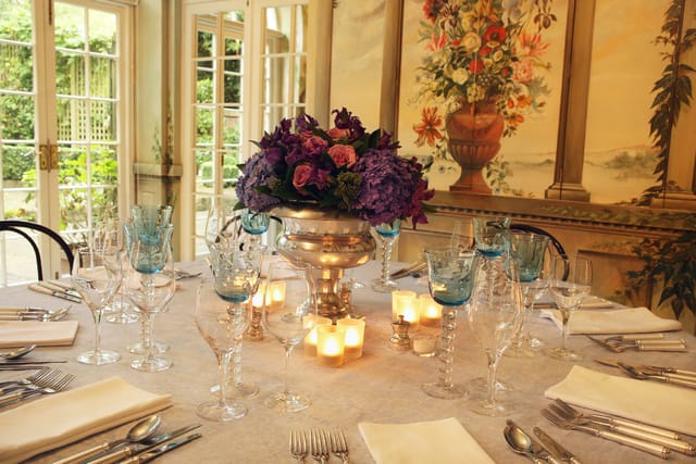 Elegant dining table in The Orangery, perfect for weddings and upscale events.