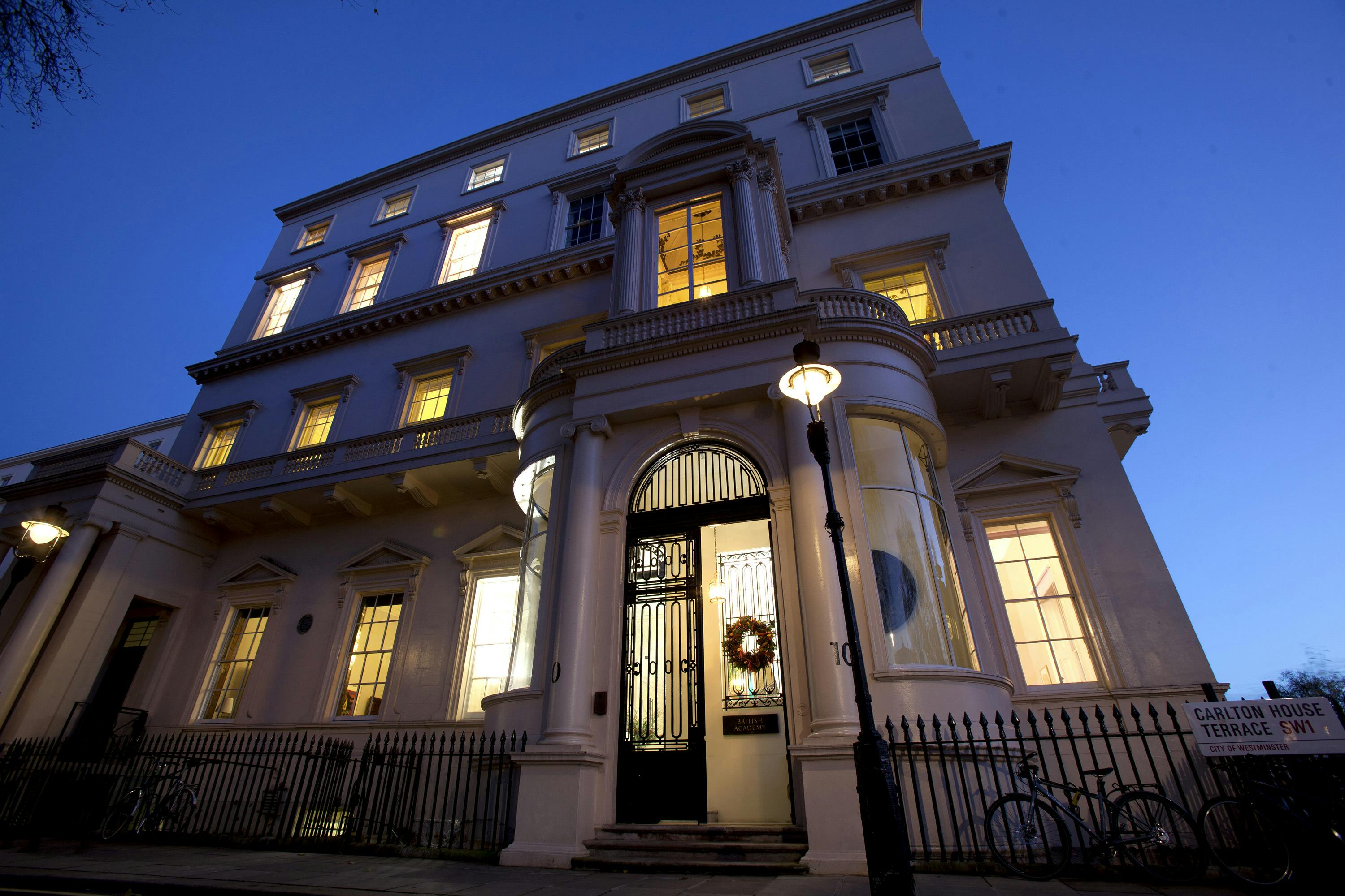Christmas party at Carlton House Terrace, featuring elegant architecture and warm lighting.