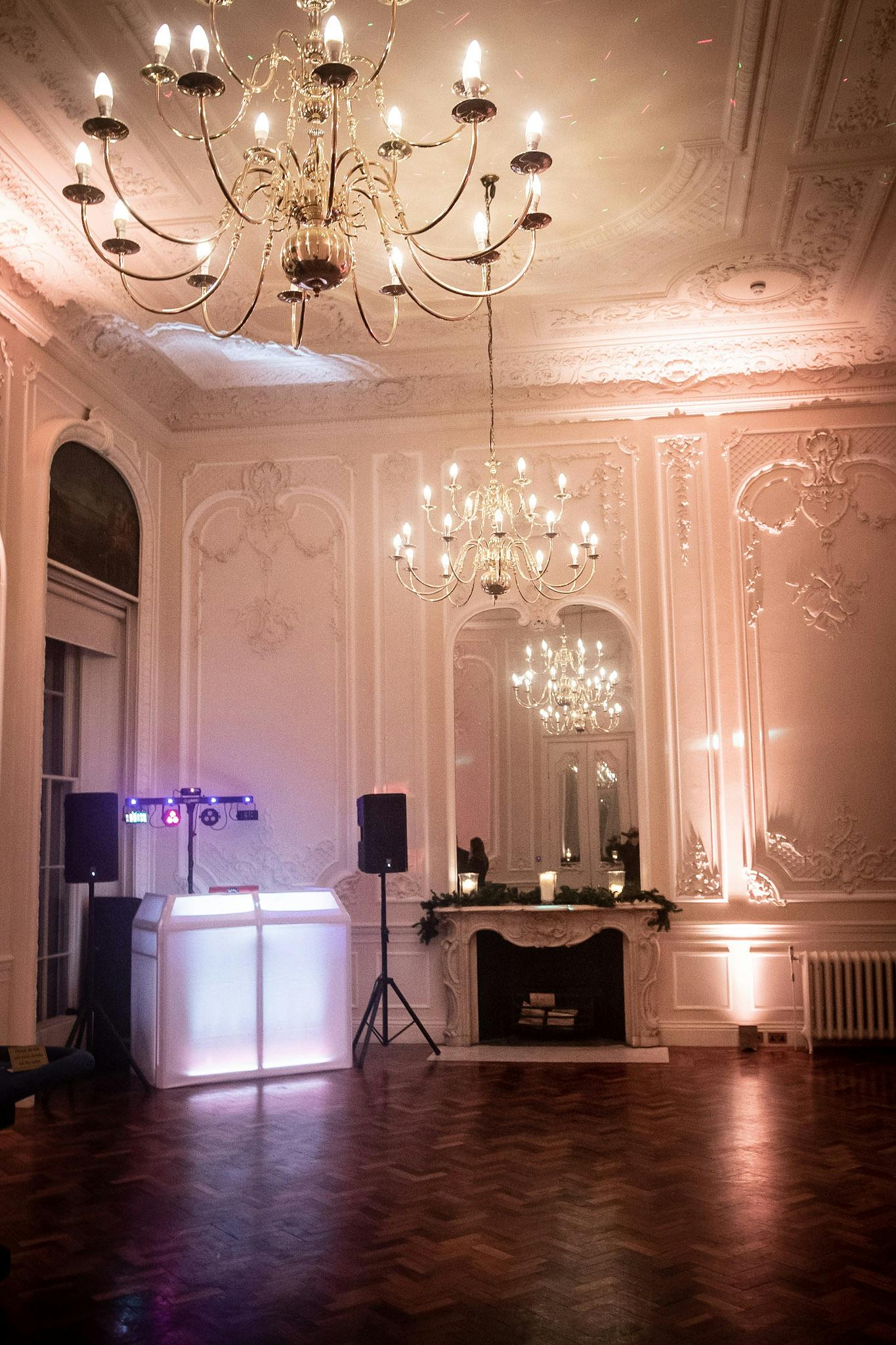 Elegant chandelier in upscale Westminster event space for Christmas parties.