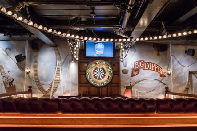 The Big Dipper venue with vintage carnival decor for team-building events.