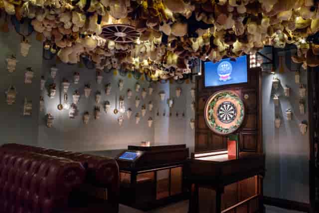 Whimsical event space with plush ceiling, ideal for team-building and gatherings.