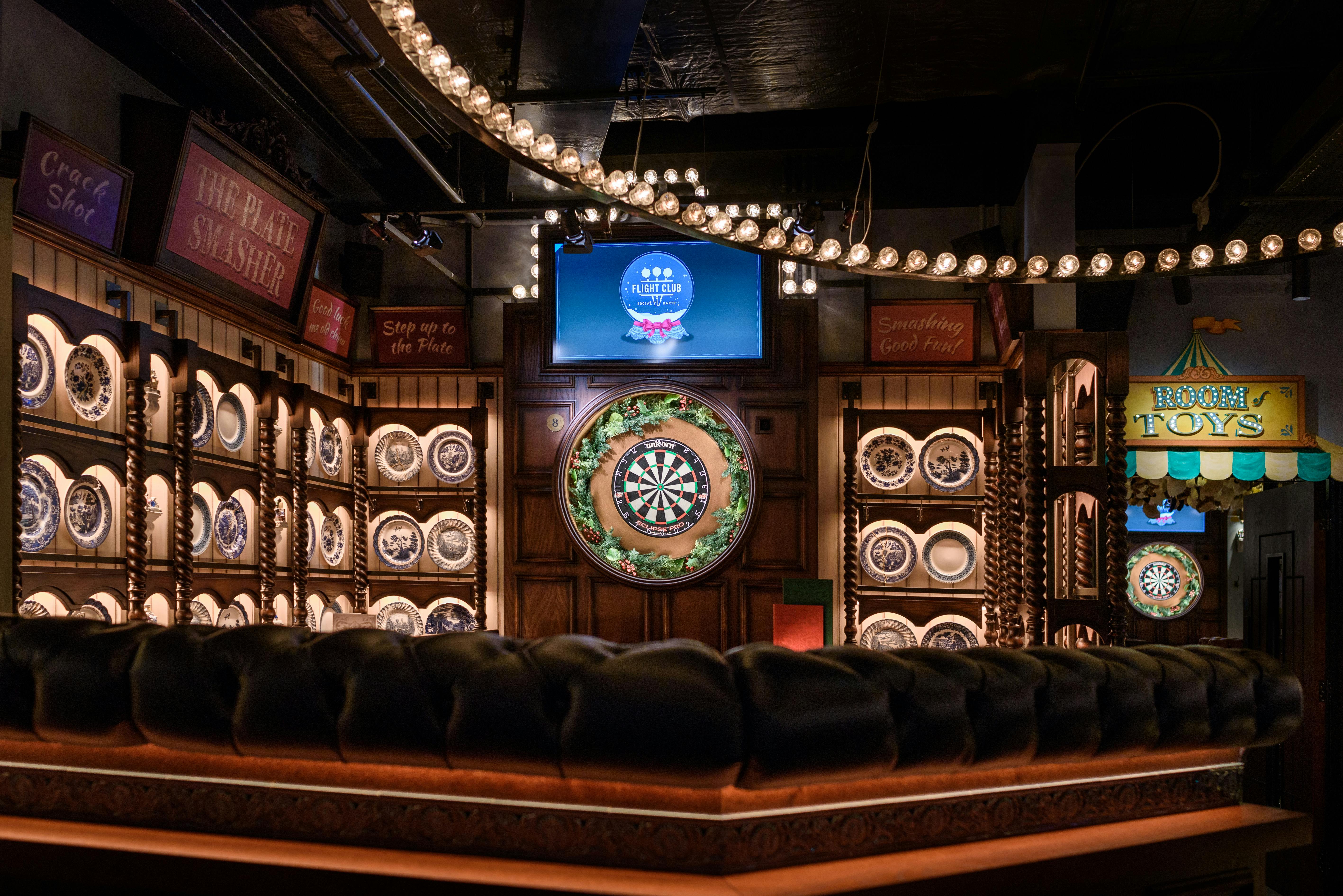 Alt tag: "Interactive event space with dartboard at Flight Club Victoria for team-building activities"