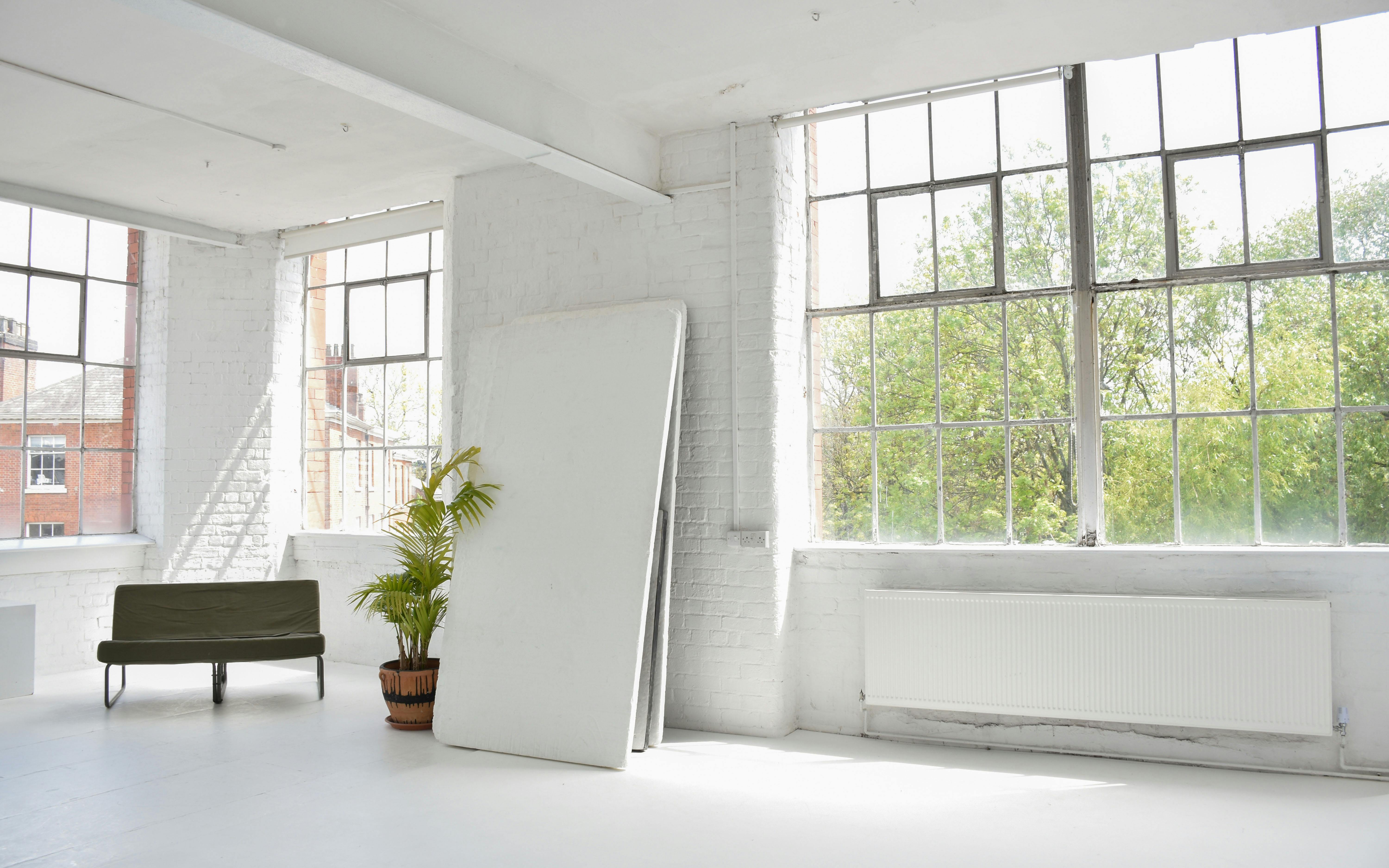 Bright event space with large windows, perfect for workshops and gatherings.