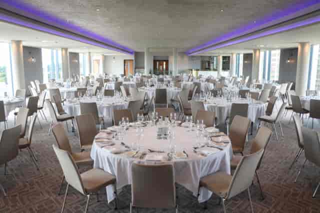 Sky Gallery event space in Park Regis Birmingham, set for a formal dinner with elegant tables.