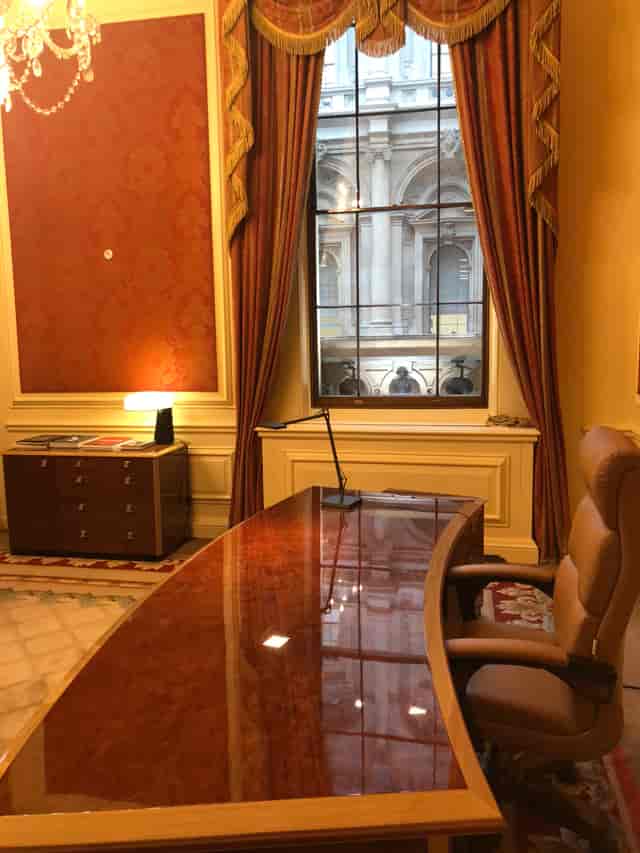 Gresham Room at The Royal Exchange: elegant meeting space with polished desk, ideal for conferences.
