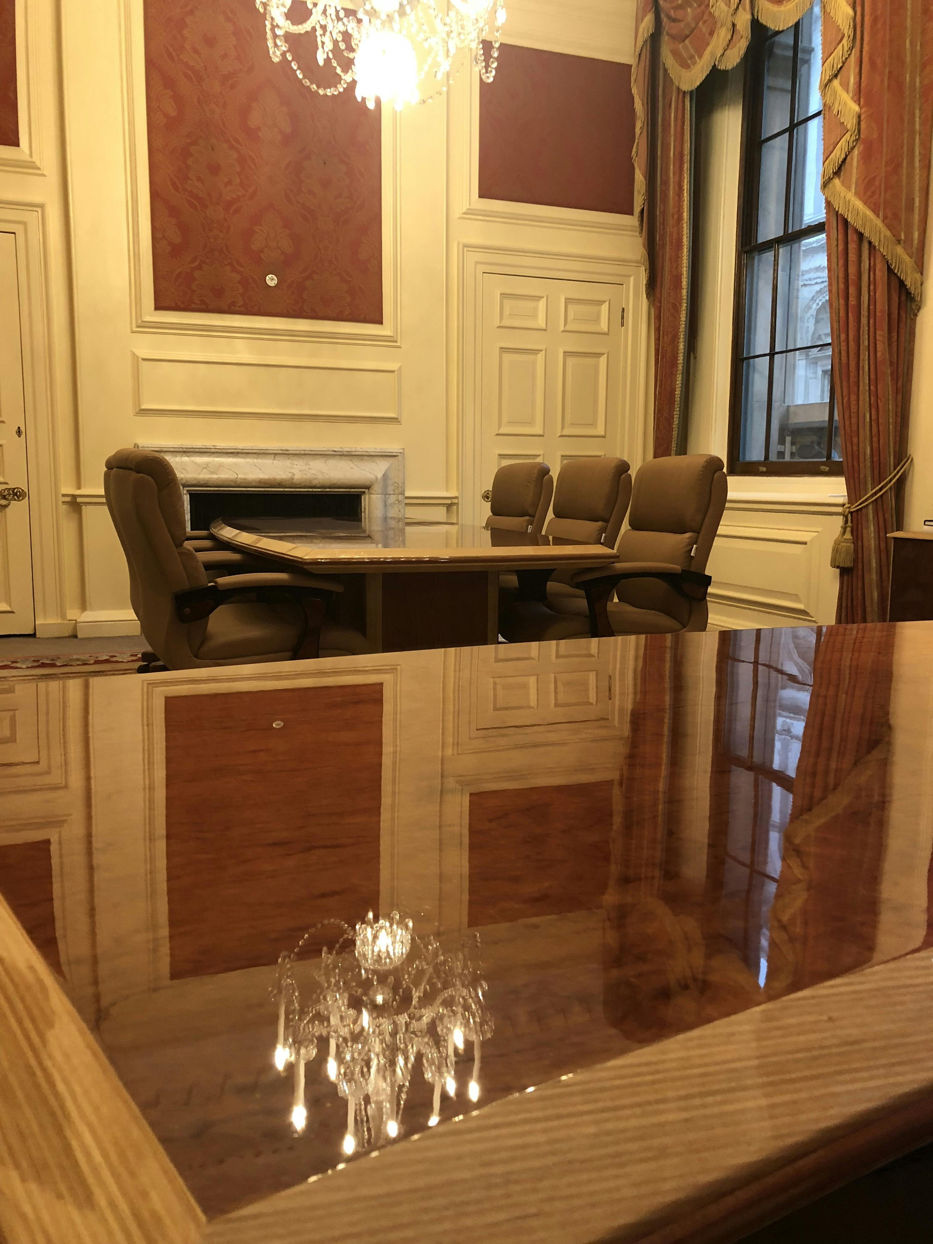 Gresham Room at The Royal Exchange: elegant meeting space with polished wooden table.