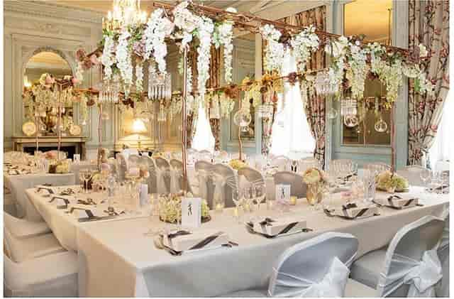 Wedgwood Dining Room banquet setting with floral decor, ideal for weddings and formal events.