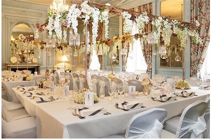 Wedgwood Dining Room banquet setting with floral decor, ideal for weddings and formal events.