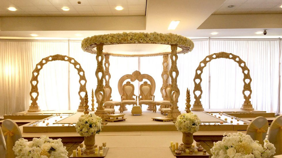 Premiership Suite at Leicester Tigers Stadium, elegant wedding venue with floral decor. - Banner