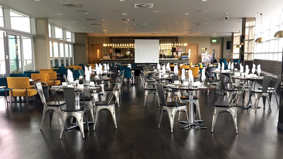 The Clubhouse Suite at Leicester Tigers Stadium, modern event space for meetings and banquets. - Banner