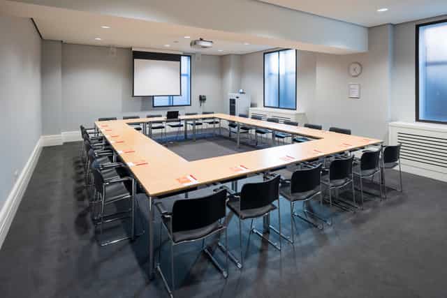 Wellcome Collection meeting room with U-shaped layout, ideal for collaborative events.