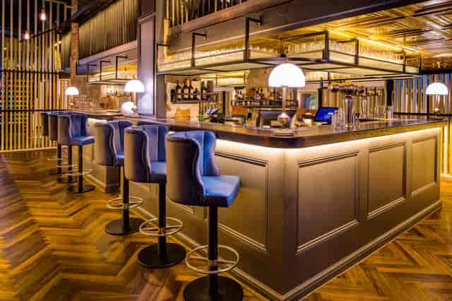 Stylish bar area in Swingers City, ideal for networking events and cocktail receptions.