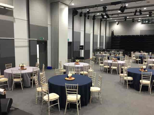 Weston Hall event space with round tables, ideal for corporate meetings and social gatherings.
