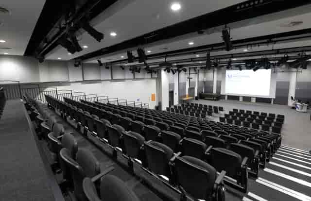 Weston Hall auditorium with tiered seating for conferences and seminars at UWL Ealing.