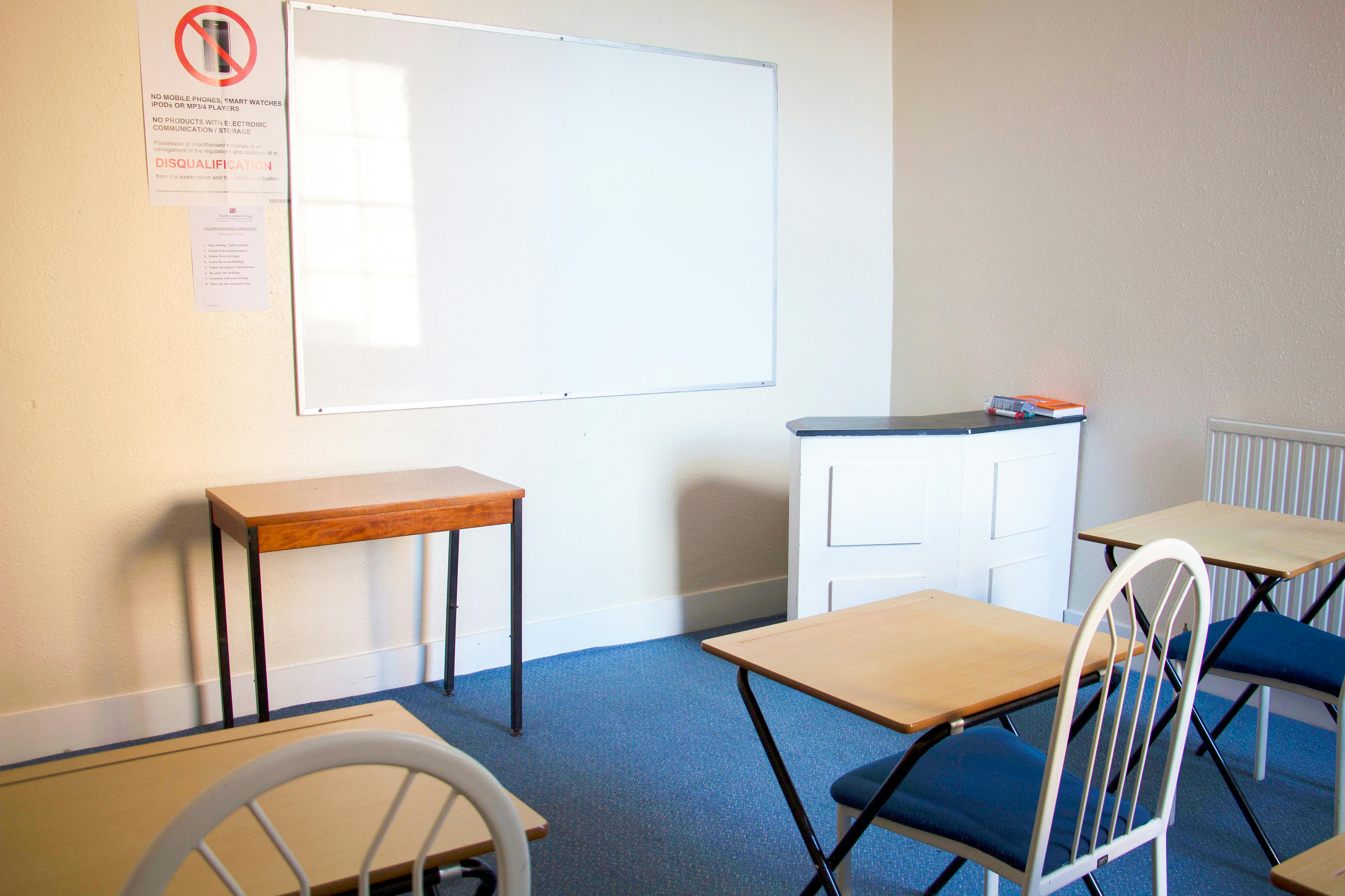 Meeting Room 103 at North London College, bright classroom for workshops and meetings.