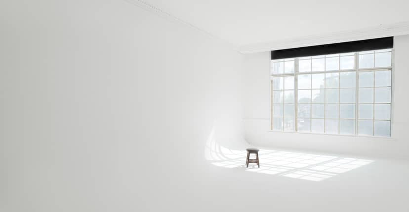 Minimalist event space with natural light for creative workshops in Wimbledon.