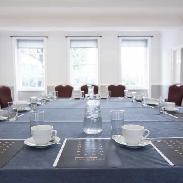Ballroom at Linden House: elegant meeting room with natural light, perfect for events.